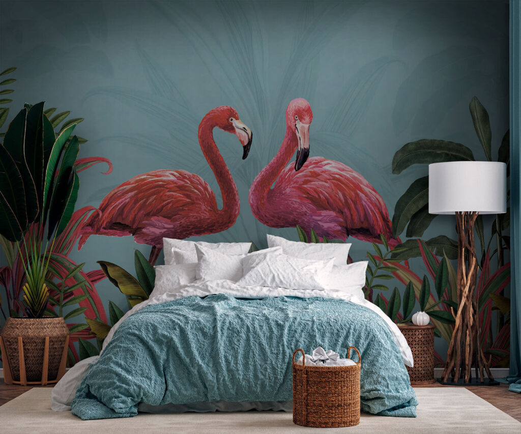 Two pink flamingos and green leaves