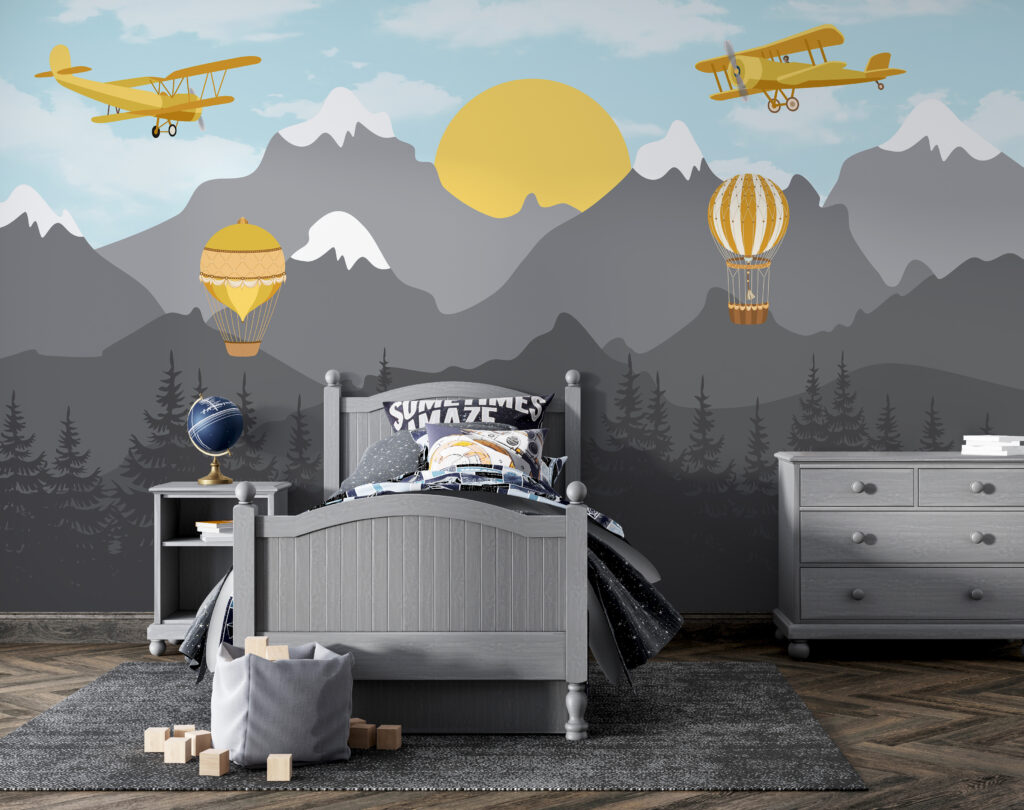 Yellow airplane flying over mountains