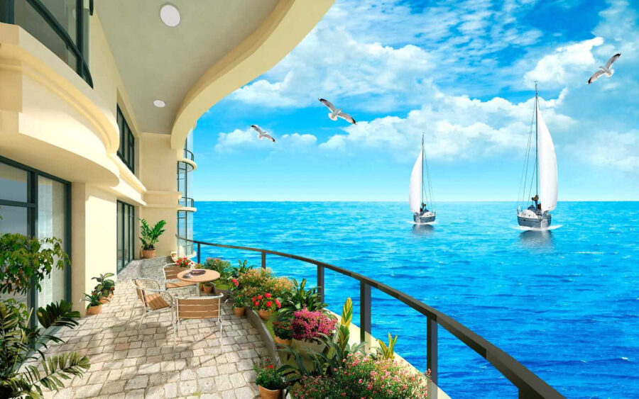 Balkon z widokiem na ocean i łodzie