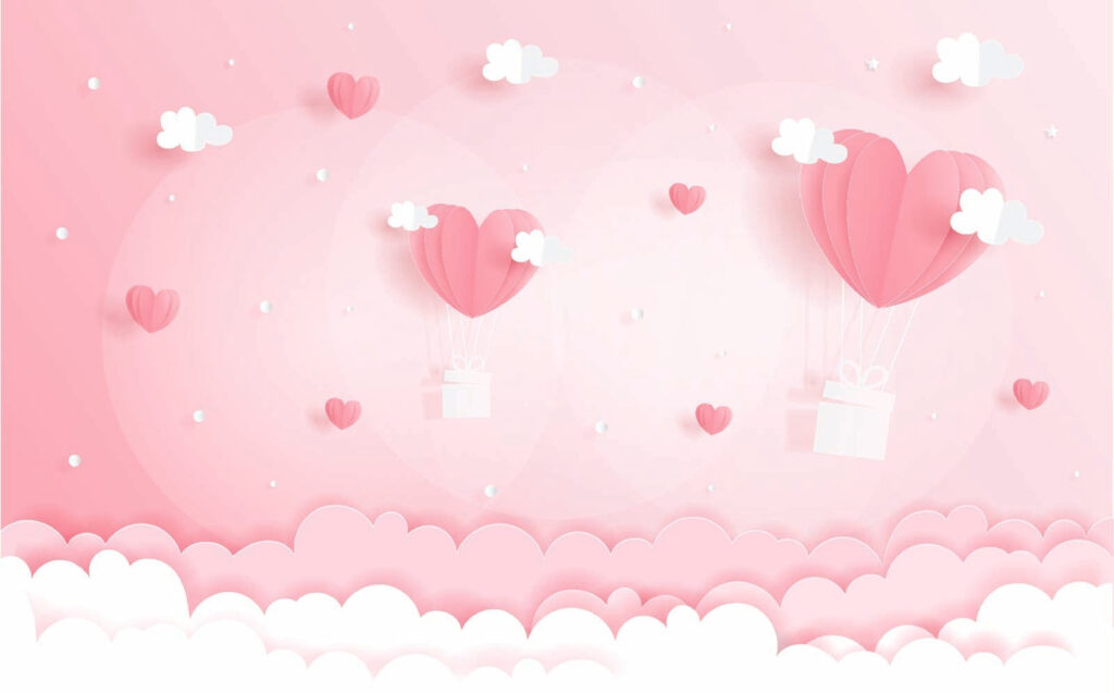 Wycinanka z różowego papieru przedstawiająca balony na ogrzane powietrze i chmury Wycinanka z różowego papieru przedstawiająca balony na ogrzane powietrze i chmury