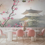 Fototapeta Drzewo z różowymi kwiatami i budynkiem w tle