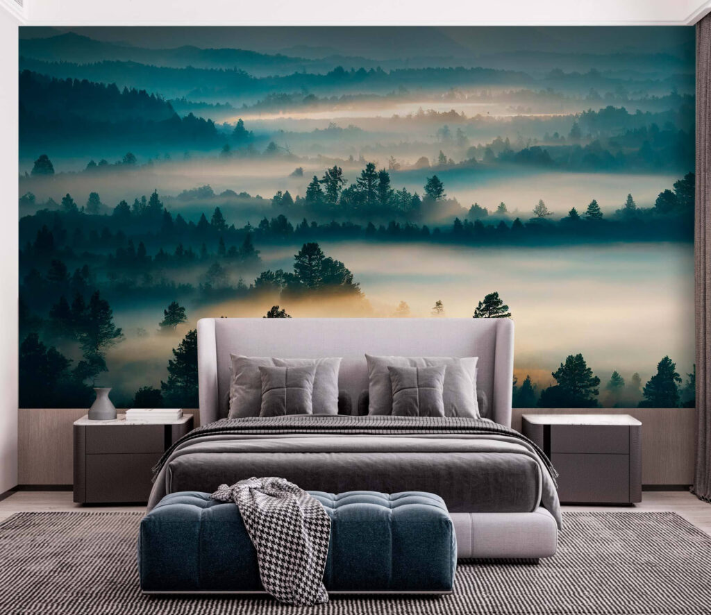 Foggy landscape with trees and mountains