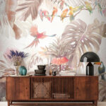 Fototapeta Grupa ptaków na gałęzi otoczona tropikalnymi roślinami