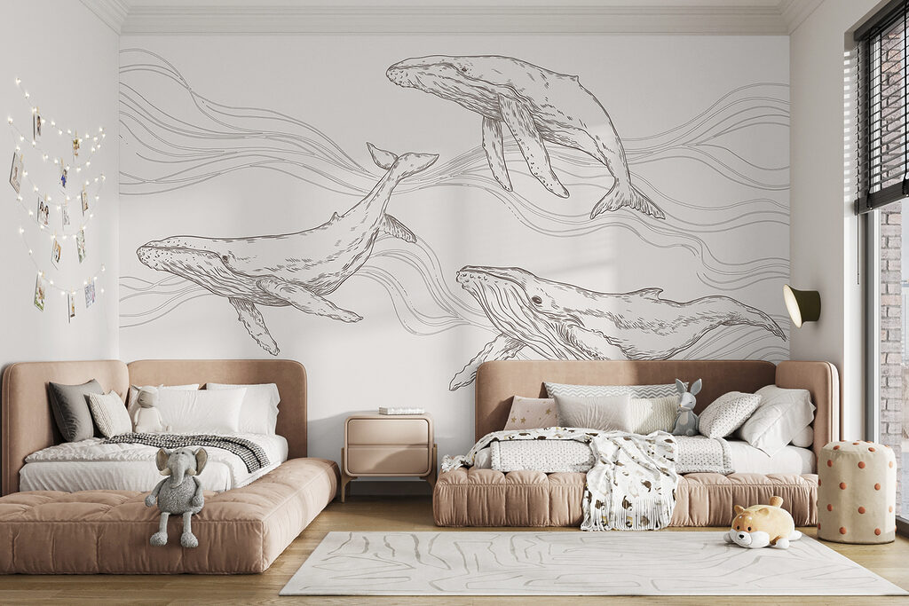 A group of whales swimming in the water