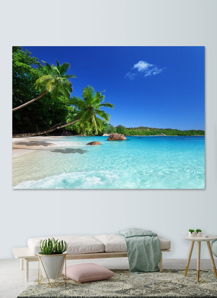 A beach with palm trees and blue water A beach with palm trees and blue water