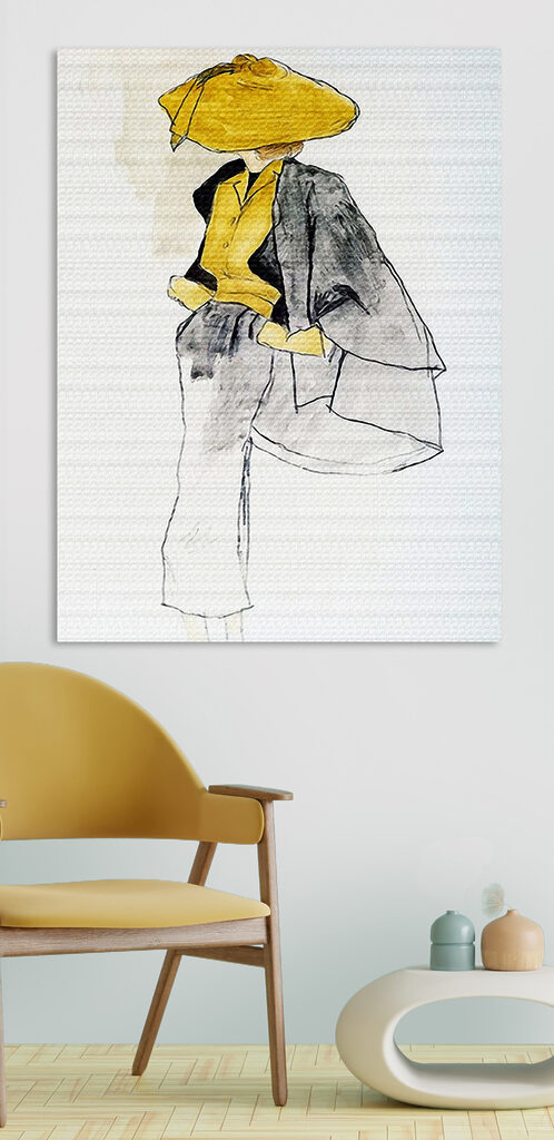 A woman wearing a yellow shirt and grey pants
