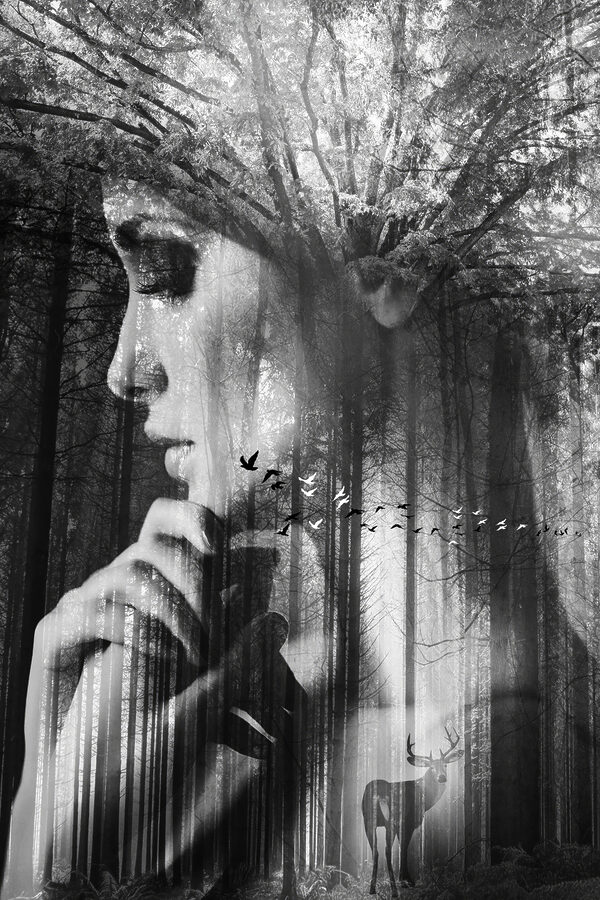 A woman with her hand on her chin A woman with her hand on her chin
