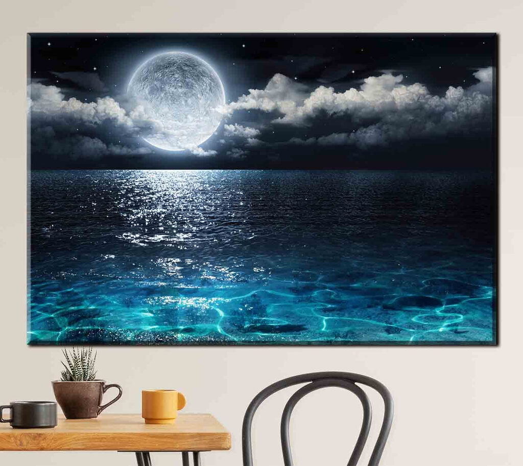 A moon over water at night A moon over water at night
