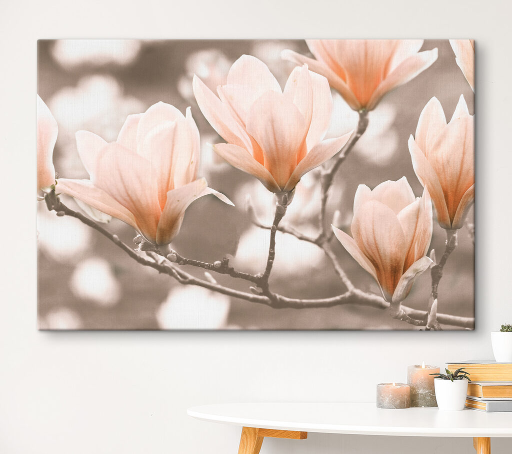 A group of flowers on a branch