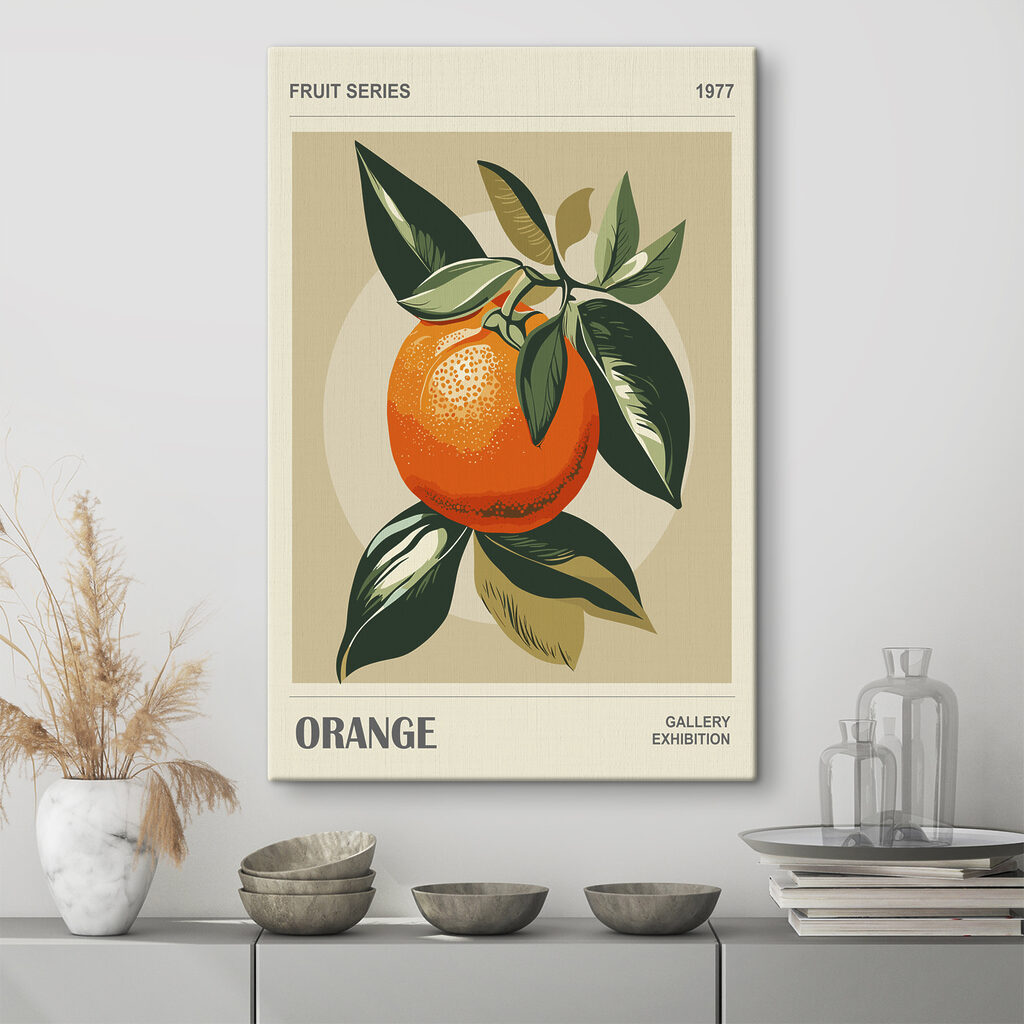 An orange with leaves on a branch An orange with leaves on a branch