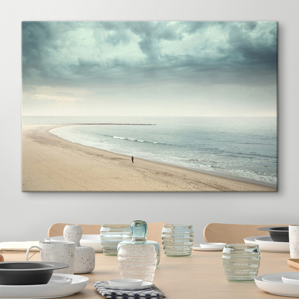 A person walking on a beach