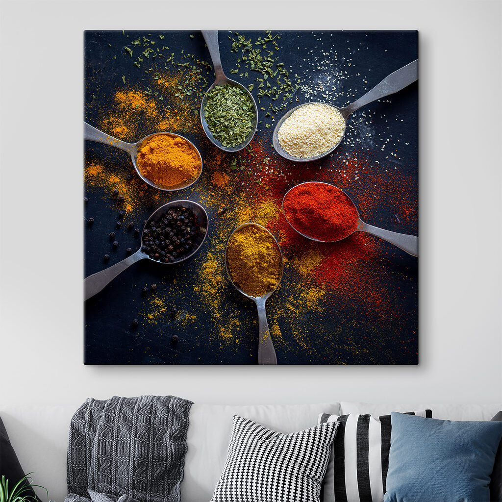 A group of spoons with different spices