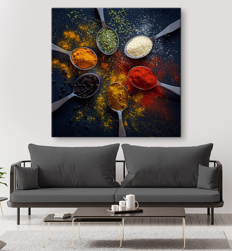 A group of spoons with different spices