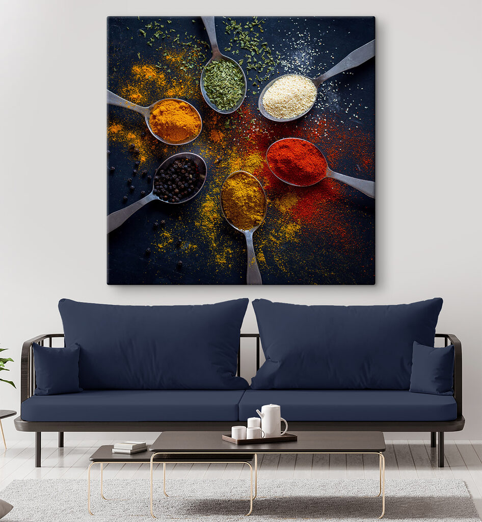 A group of spoons with different spices