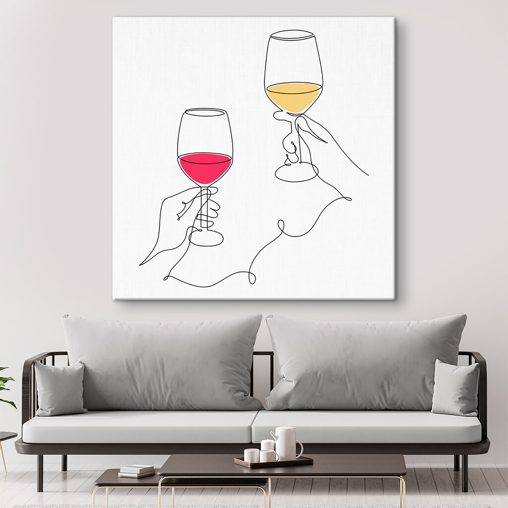 A hand holding wine glasses A hand holding wine glasses