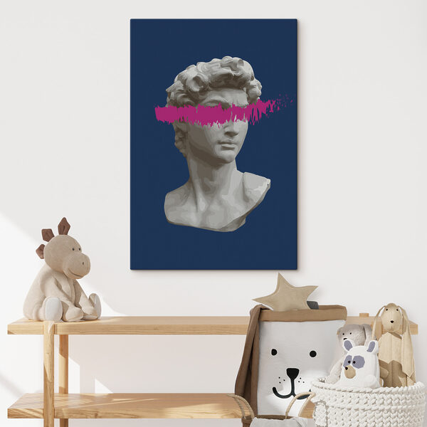 A statue of a man with a pink line