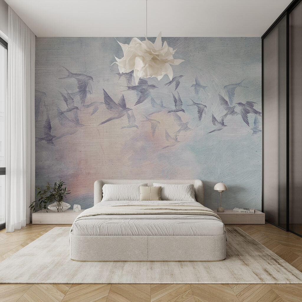 A flock of birds flying in the sky