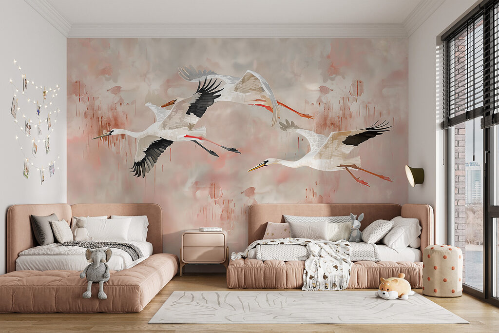 A group of birds flying in the sky