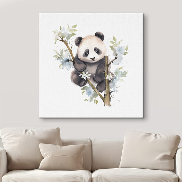 A panda bear on a tree branch
