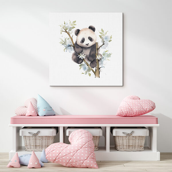 A panda bear on a tree branch
