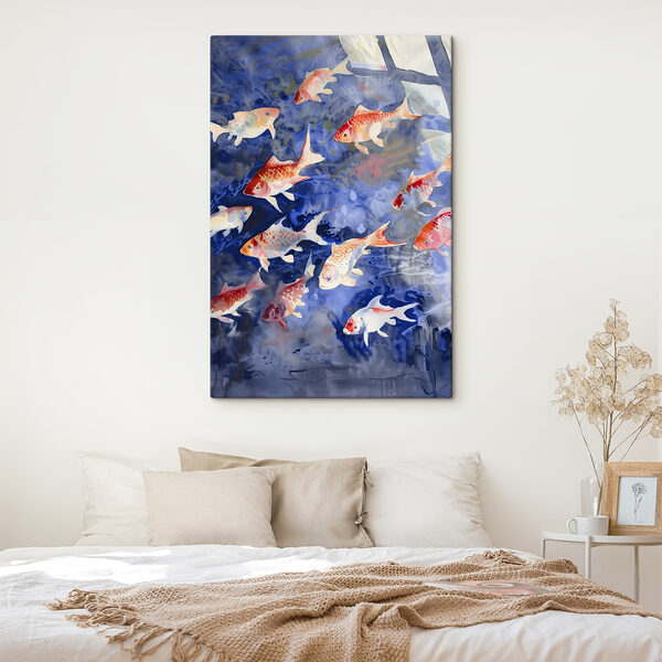 A group of fish swimming in water A group of fish swimming in water