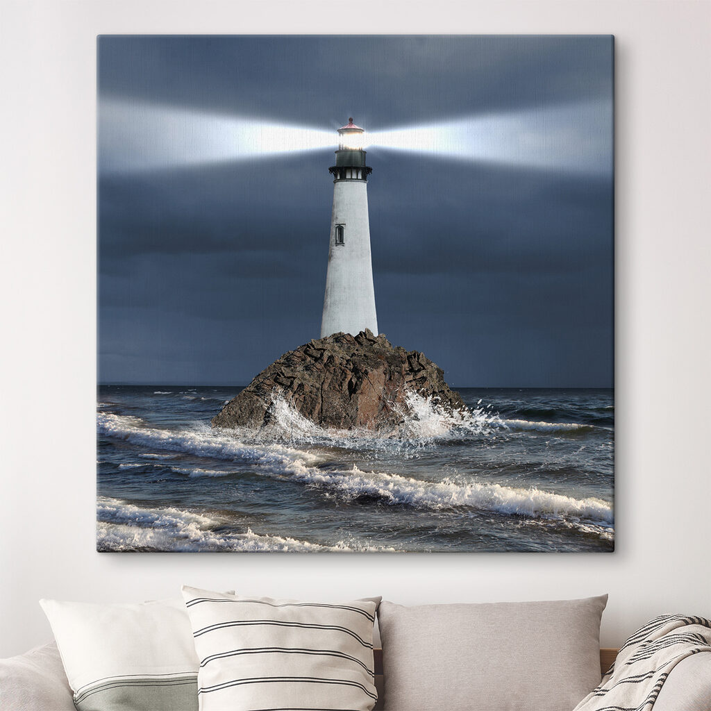 A lighthouse on a rock in the ocean A lighthouse on a rock in the ocean