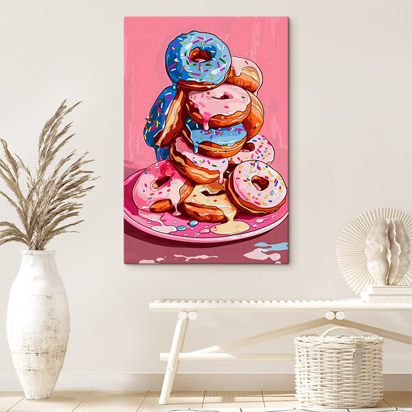 A stack of donuts with frosting and sprinkles