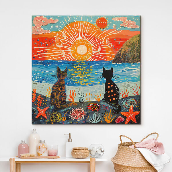 Two cats sitting on a beach looking at the sun Two cats sitting on a beach looking at the sun