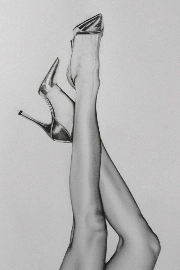 A drawing of a woman's legs and high heels