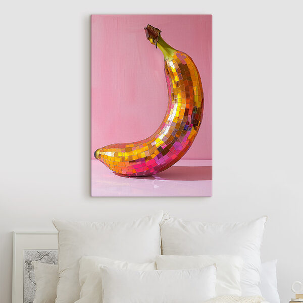 Colorful mirror banana on a pink background