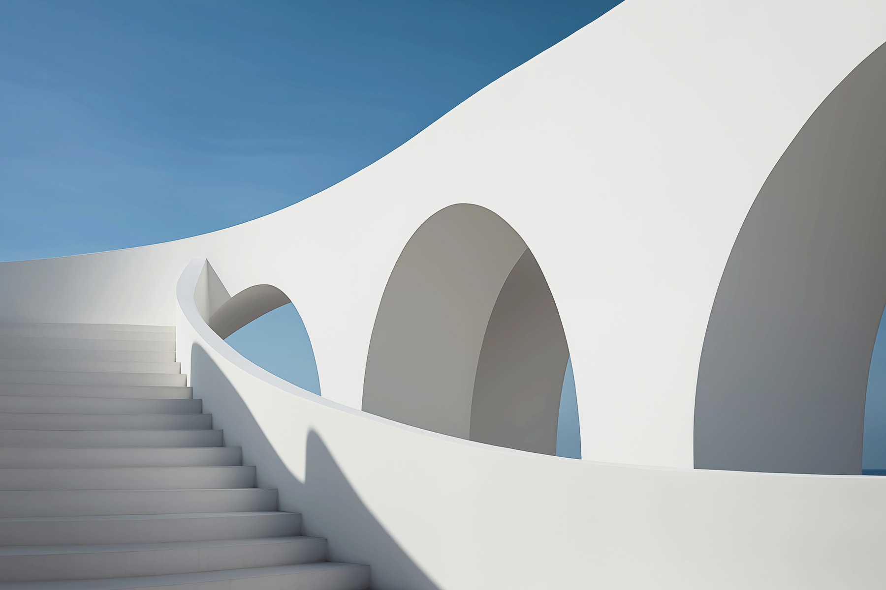 White staircase with arches