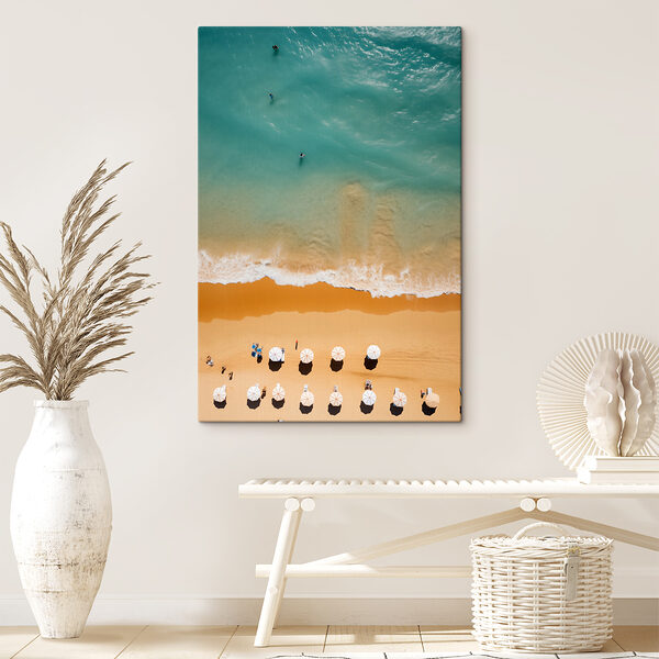 Group of people on a beach with umbrellas