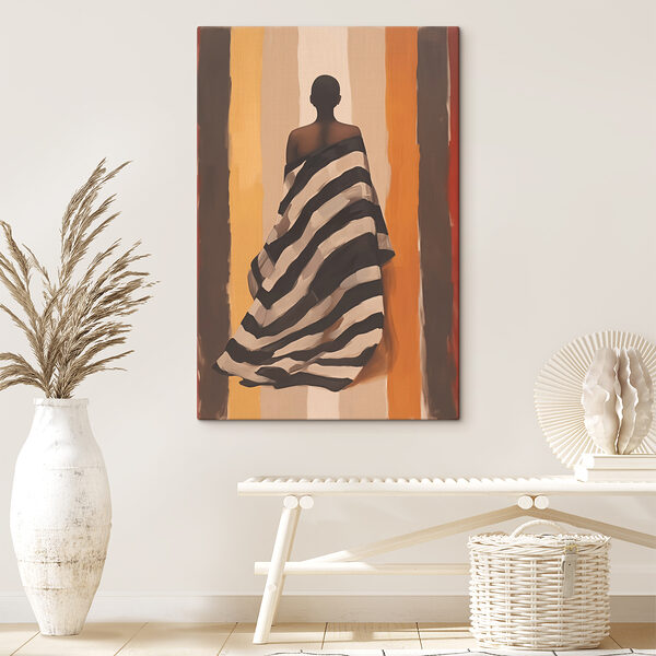 Woman wrapped in a striped blanket