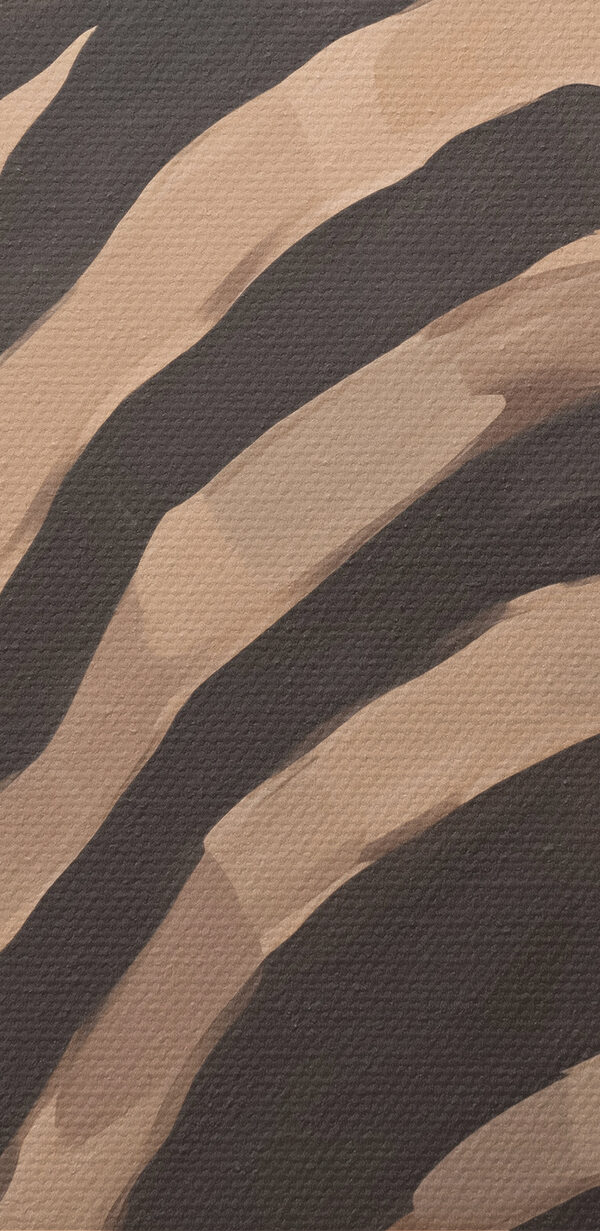 Woman wrapped in a striped blanket