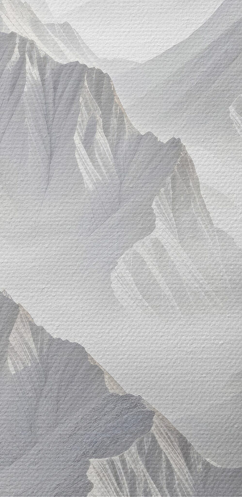 Snowy mountain range with clouds