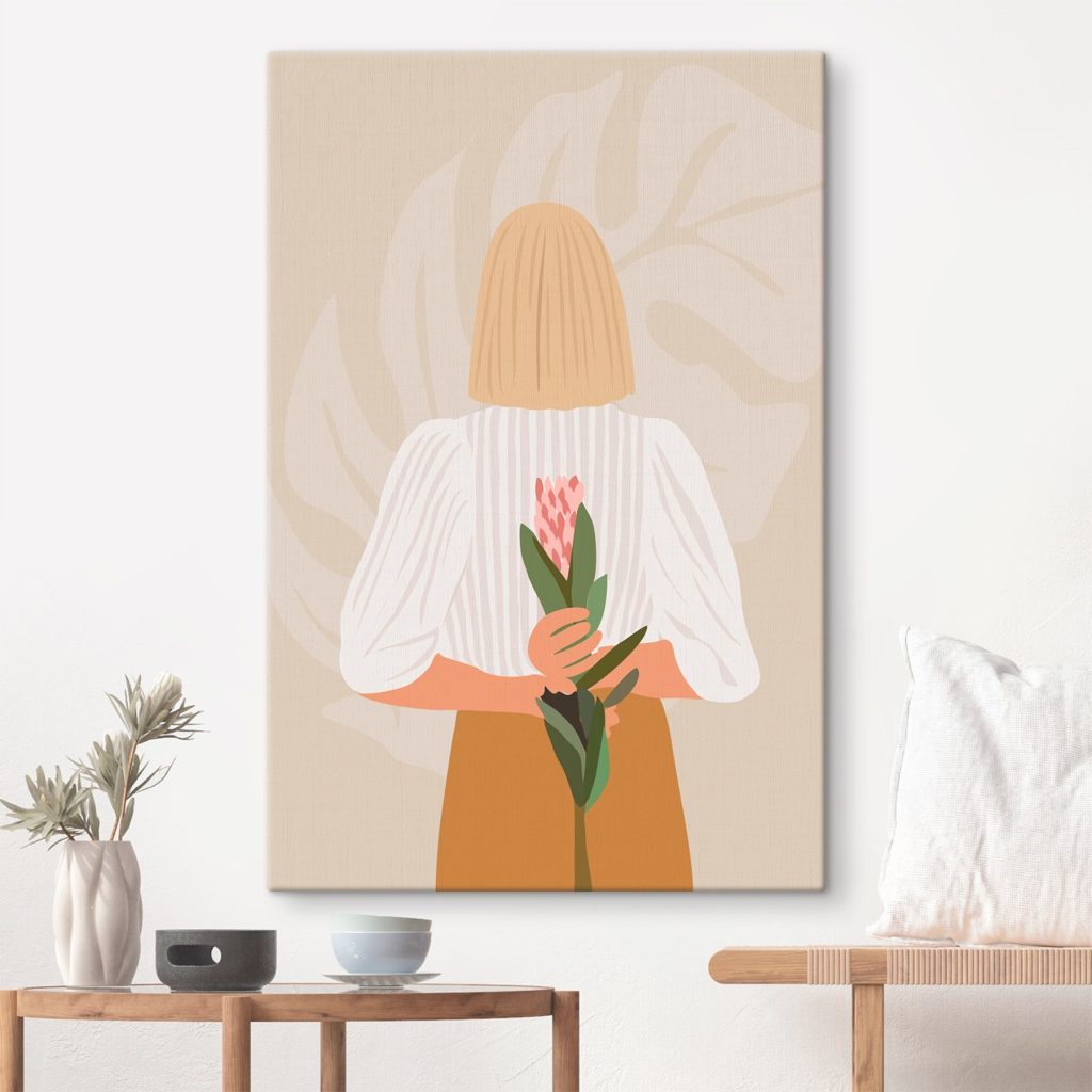 Woman holding a flower Woman holding a flower