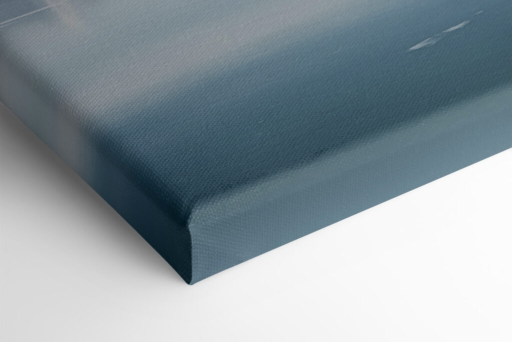 Red house on an island in water with snow covered mountains in the background Red house on an island in water with snow covered mountains in the background