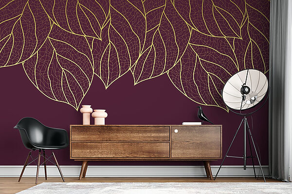 Elegant leaves on deep maroon background