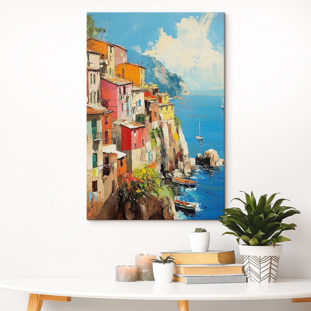 Painting of a colorful town on a cliff by the water
