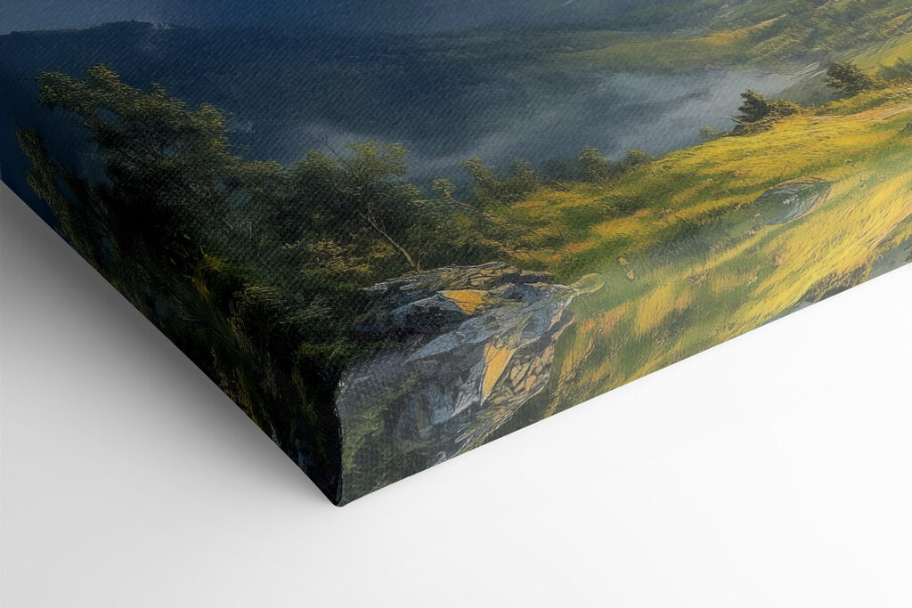 Landscape of mountains and a valley with clouds and sun