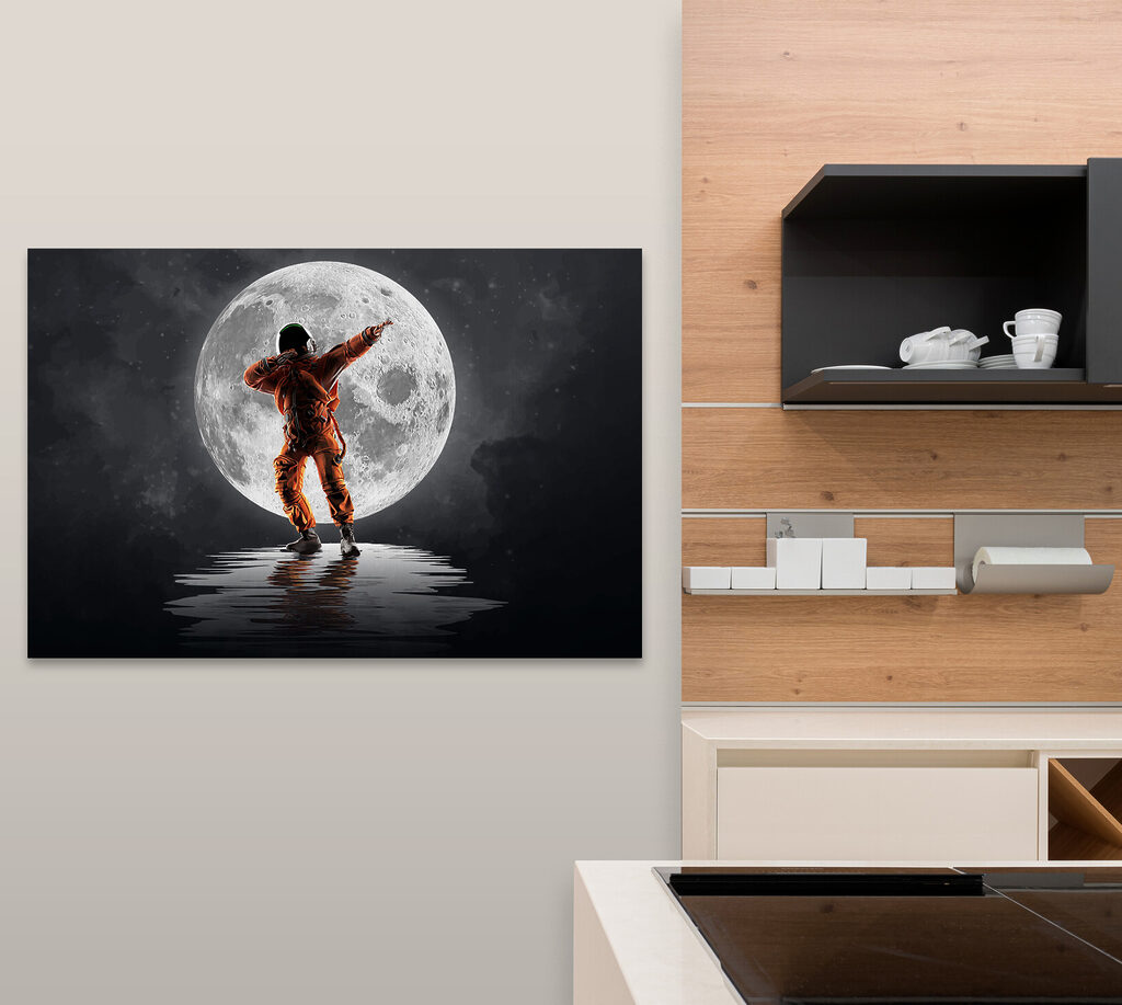 Man in an orange suit standing in front of a full moon