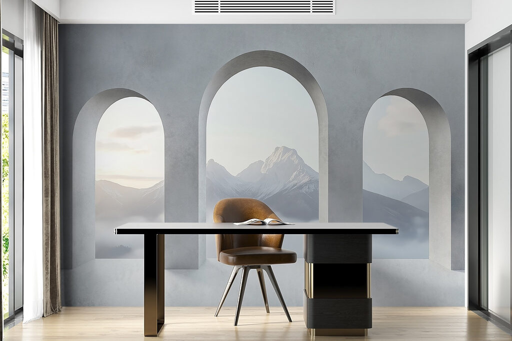 White room with arched windows and mountains in the background