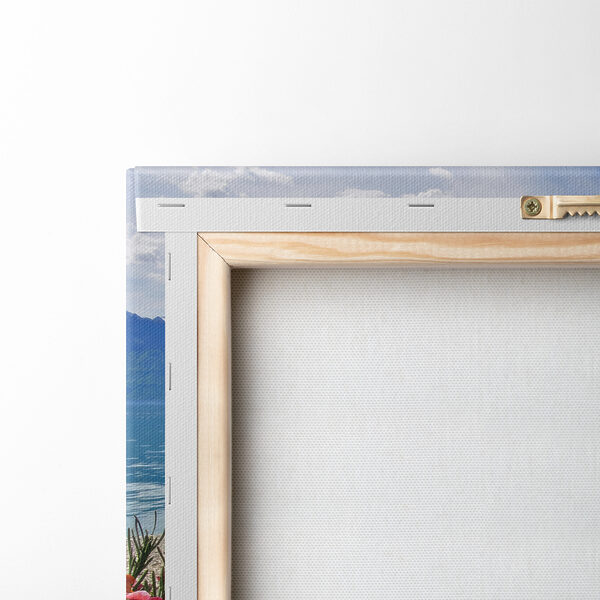 Canvas prints Flower bed with flowers and a lake in the background Canvas prints Flower bed with flowers and a lake in the background