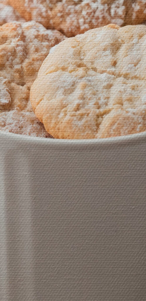 Cup of cookies with powdered sugar Cup of cookies with powdered sugar