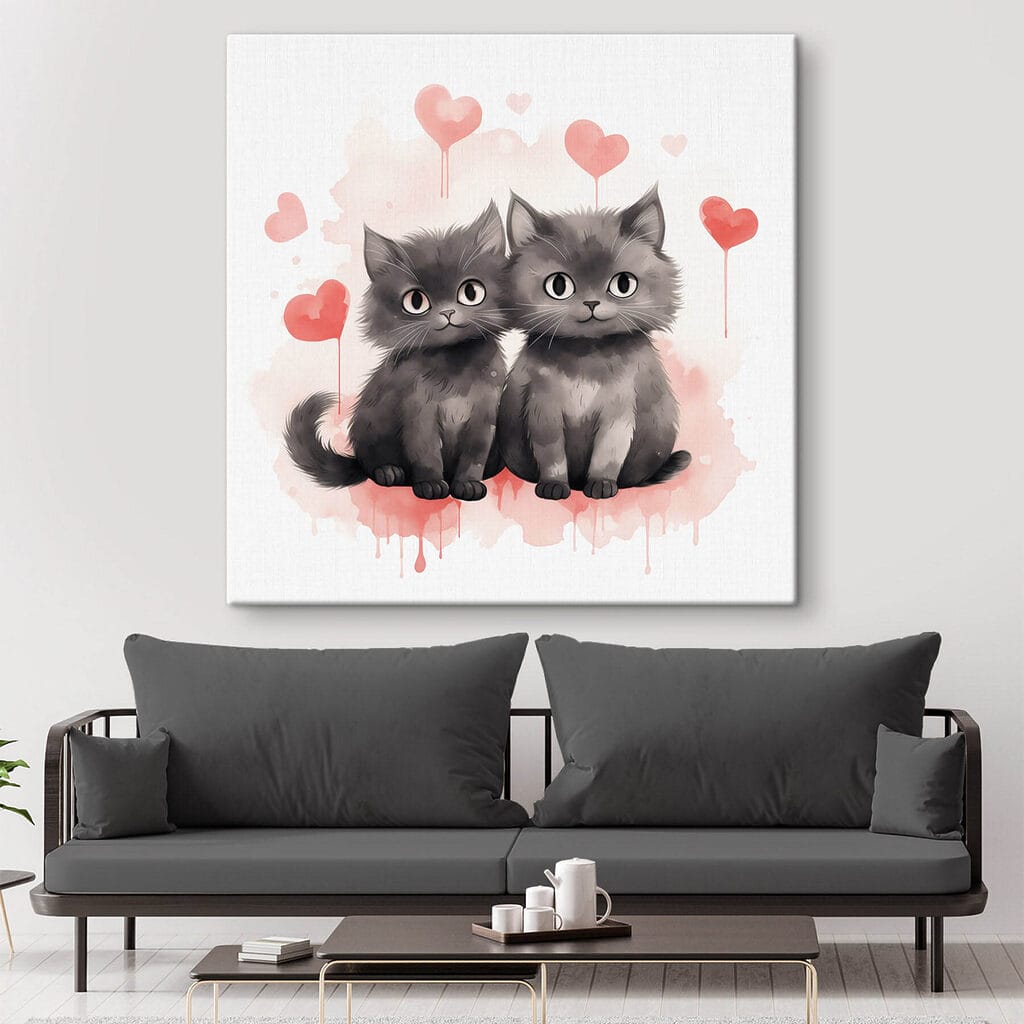 Two cats sitting next to each other