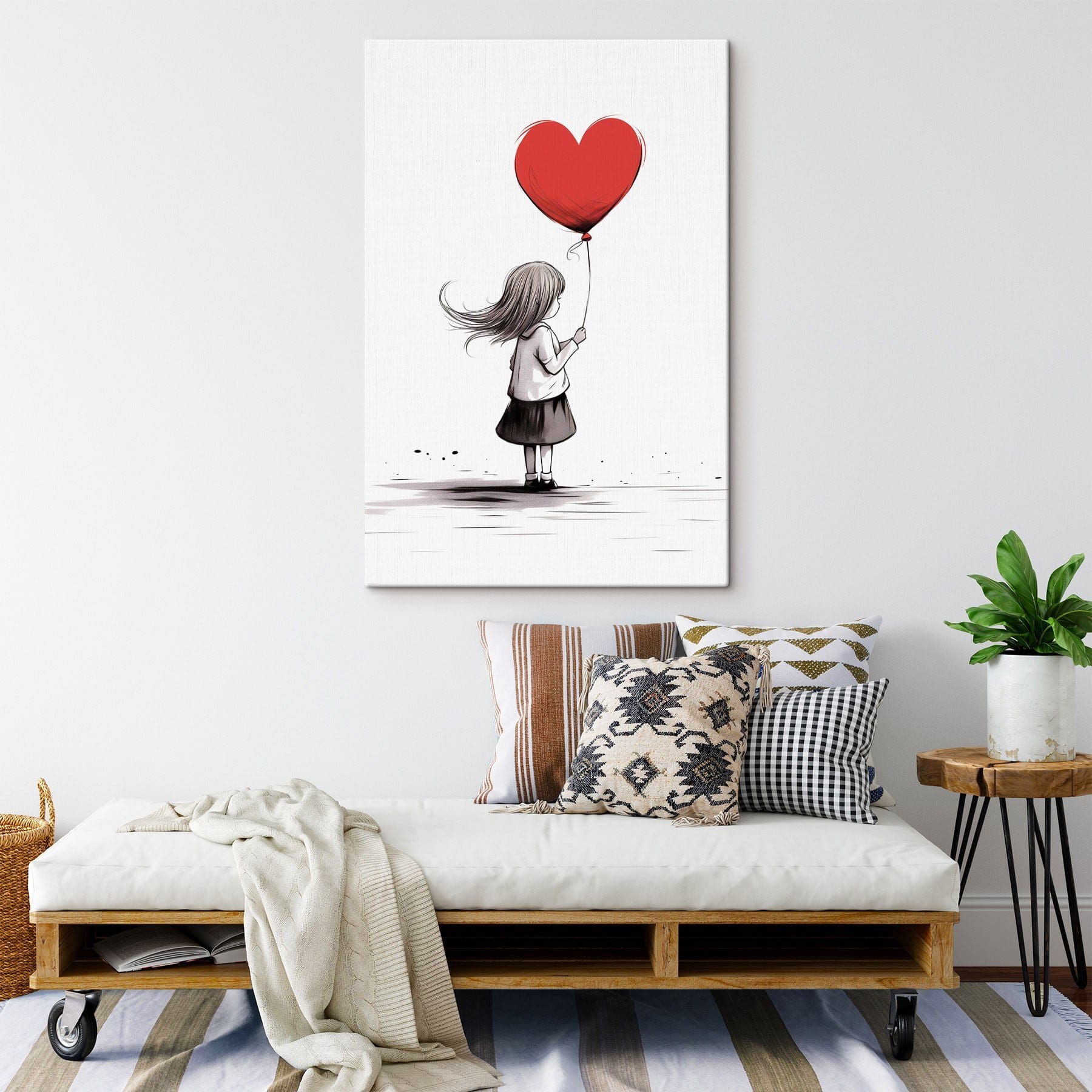Girl holding a heart shaped balloon
