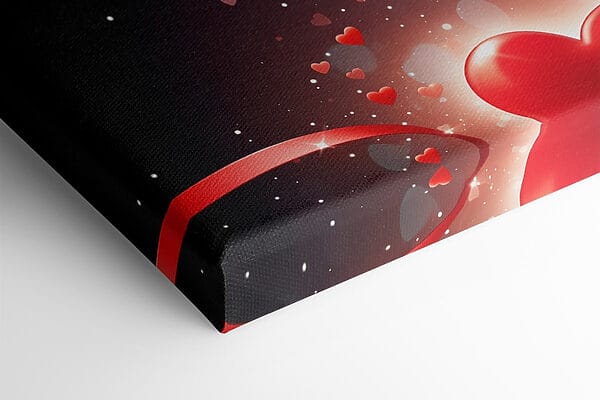 Dwa serca z czerwonymi wstążkami i światełkami Dwa serca z czerwonymi wstążkami i światełkami