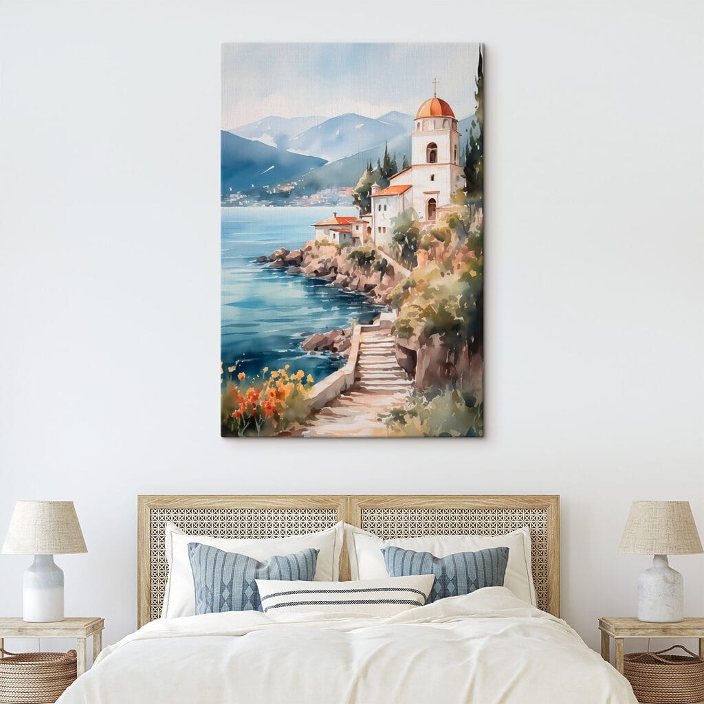 Watercolor painting of a building on a cliff by a body of water