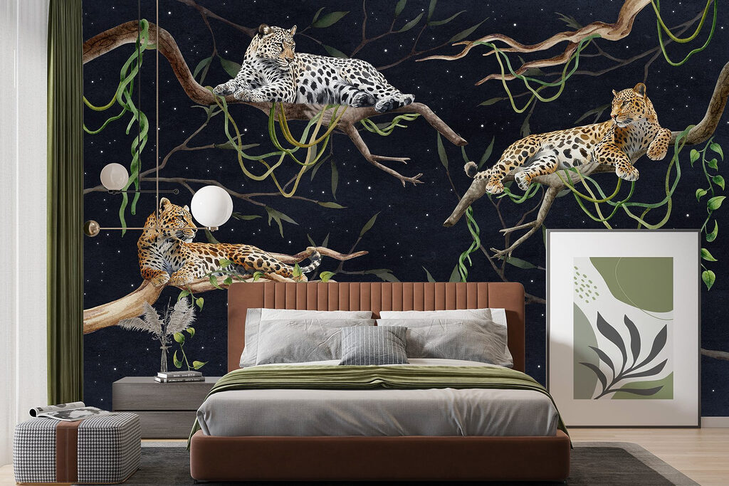 Group of leopards lying on branches