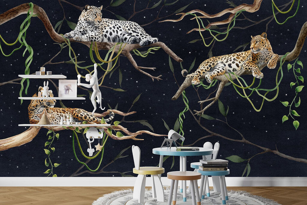 Group of leopards lying on branches